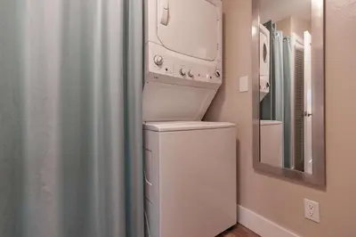 a washer and dryer in a bathroom with a shower at Galena Getaway: Dog-Friendly Frisco Retreat in Frisco
