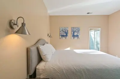 a bedroom with a white bed and a window at Galena Getaway: Dog-Friendly Frisco Retreat in Frisco