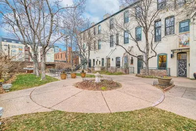 a courtyard with a fire hydrant in front of a building at 2193 Arapahoe St Unit 17 in Denver