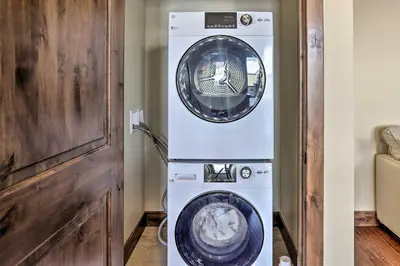 a washing machine and a washer in a room at half Mi to Dtwn Golden Gem with Patios! in Golden