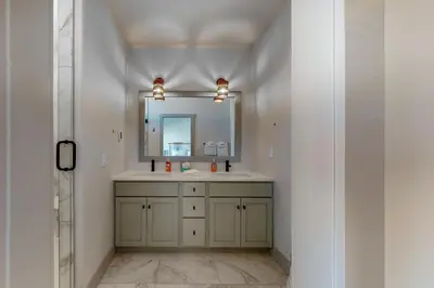 a bathroom with a sink and a mirror at Eagle Ridge Retreat in Granby