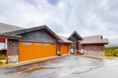 a house with an orange garage at Tabernash Tranquility in Tabernash