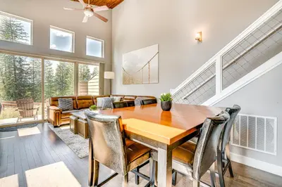 a dining room with a table and a couch at 6 Mi to Winter Park Resort Home with Free Shuttle in Winter Park