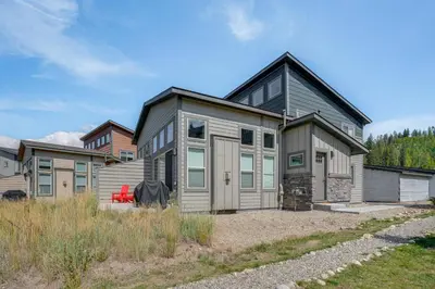 a large house with a garage at 6 Mi to Winter Park Resort Home with Free Shuttle in Winter Park