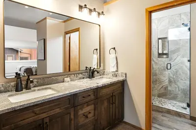 a bathroom with a sink and a shower at Mount Royal in Frisco