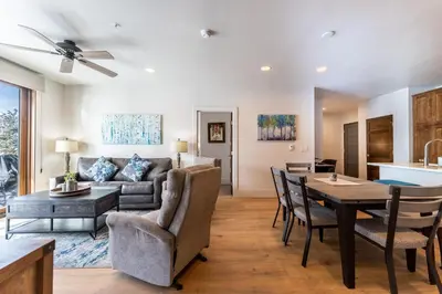 a living room with a couch and a table at Blue R Flats Bld 1 103 in Silverthorne