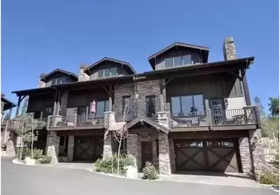 a large wooden house with a balcony at 751 Mountain Terrace in Fraser