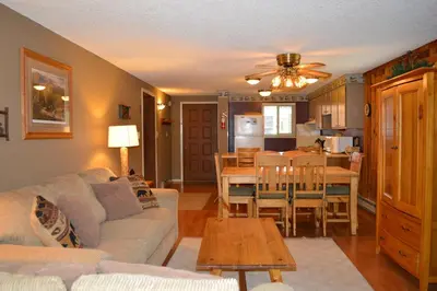 a living room with a couch and a table at Beaver Village Unit #0521R in Winter Park