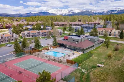 an aerial view of a tennis court and buildings at Meadow Ridge Court 9 Unit 4 in Fraser