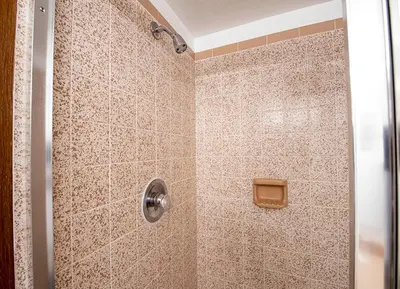 a bathroom with a shower with a glass door at Meadow Ridge Court 28 Unit 6 in Fraser
