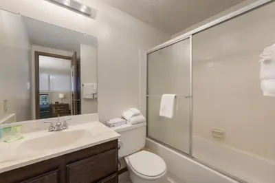 a bathroom with a sink and a toilet and a shower at Beaver Village Unit #0623 in Winter Park