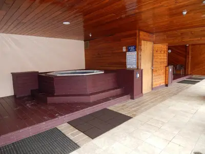 a room with a jacuzzi in a building at Crestview Place Unit 607 in Winter Park
