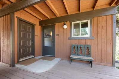 a porch of a house with a door and a window at Beaver Village Unit #0514 in Winter Park