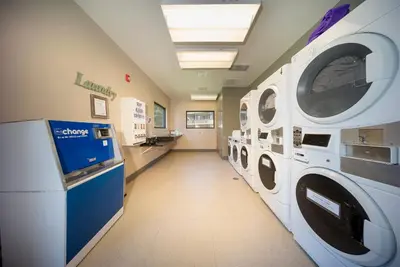 a laundry room with a washer and dryer at Hi Country Haus Unit 1908 in Winter Park
