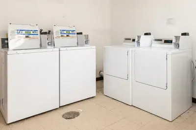 three white refrigerators with boxes on top of them at Silverado I Building A Unit 101 in Winter Park