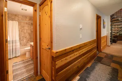 a bathroom with a shower and a toilet and a sink at Creekside Unit 403 in Winter Park