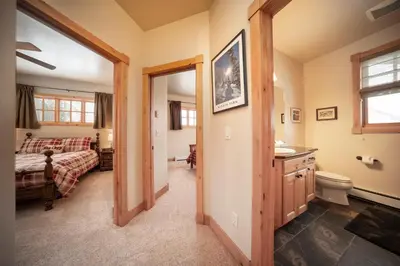 a bathroom with a sink and a toilet in a room at 500 North Lupine in Fraser