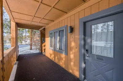 a door on the side of a house at Hi Country Haus Unit 2501 in Winter Park