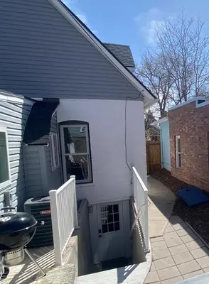 a side view of a house with a grill at Artsy Platt Park Apartment Guest Suite for 4, QUICK Mountain Access! in Denver