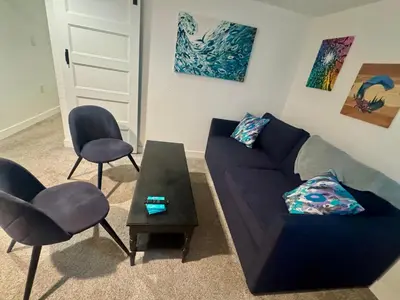 a living room with a couch and two chairs at Artsy Platt Park Apartment Guest Suite for 4, QUICK Mountain Access! in Denver