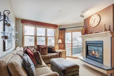 a living room with a couch and a fireplace at Silver Mill 8253 - 1Br-Walk to Slopes! Kids Ski Free! condo in Keystone