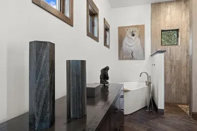 a bathroom with a sink and a counter with a sink at Skyes Peak - Luxury Mountain Retreat with Breathtaking Views in Estes Park