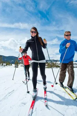 a group of people on skis in the snow at Silver Mill 8173 - 1Br-Walk to Slopes! Kids Ski Free! condo in Keystone