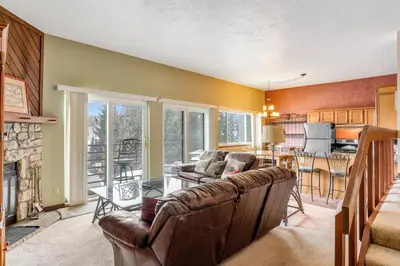 a living room with a couch and a table at Buffalo Ridge B107 in Silverthorne