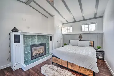 a bedroom with a bed and a fireplace at Multi-Unit Denver Vacation Rental Home! in Denver