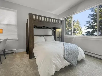 a bedroom with a large bed and a window at 928A Lakepoint Circle 3Br 2,5Ba home in Frisco