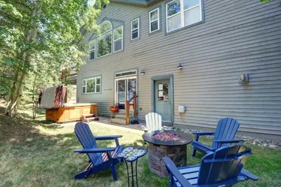 a group of chairs and a table in front of a house at 928A Lakepoint Circle 3Br 2,5Ba home in Frisco