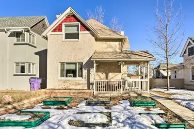 a house with snow on the ground in front of it at 3 Mi to Dtwn Convenient Denver Apt in Denver