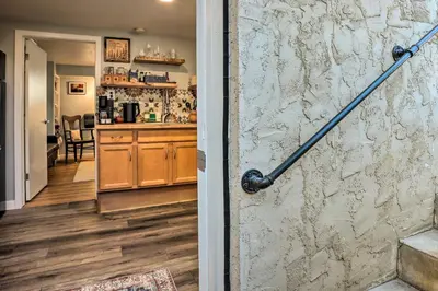 a view of a kitchen from the hallway of a house at 3 Mi to Dtwn Convenient Denver Apt in Denver