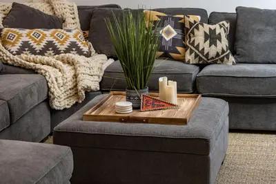 a living room with a couch and a coffee table at The Modern Mountaineer in Bailey