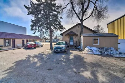 a car parked in a parking lot next to a building at Vacation Rental Near Boyd Lake, Colorado! in Loveland
