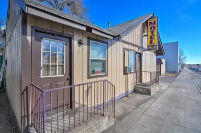 a building with a sign on the side of it at Pet-Friendly Loveland Vacation Rental! in Loveland