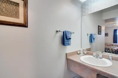 a bathroom with a sink and a mirror at Loveland Vacation Rental Pets Welcome in Loveland