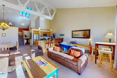 a living room with a couch and a table at Rocky Mountain Living in Dillon