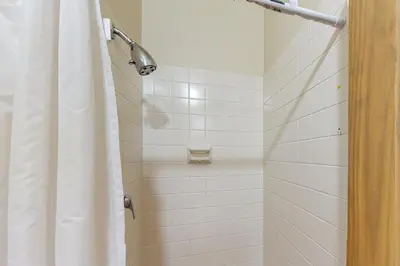 a bathroom with a shower with a shower curtain at Rocky Mountain Living in Dillon