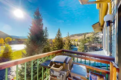 a grill on the balcony of a house at Rocky Mountain Living in Dillon