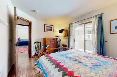 a bedroom with a bed and a window at Frisco Home Base in Frisco