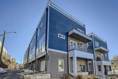 an apartment building with a blue facade at 2332 N Clay Street Unit #3 in Denver