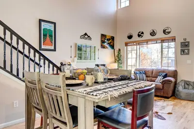 a dining room with a table and chairs at Denver Townhome in Highlands with Spacious Yard! in Denver