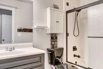 a bathroom with a sink and a shower at Denver Townhome in Highlands with Spacious Yard! in Denver