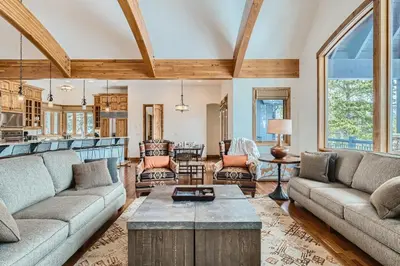 a living room with two couches and a table at NEW LISTING! Après & Fairway Retreat home in Breckenridge