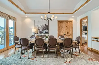 a dining room with a table and chairs at NEW LISTING! Après & Fairway Retreat home in Breckenridge
