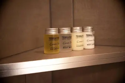 four jars of paint sitting on a shelf at Cozy- Mountain Style - River View apartment - Colorado in Silverthorne