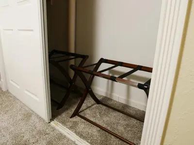 a chair sitting in the corner of a room at Private Basement, Bath, Living Area In Morrison in Morrison