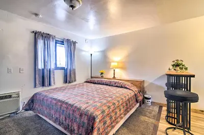 a bedroom with a bed and a window at Loveland Vacation Rental - 1 Mile to Lake! in Loveland