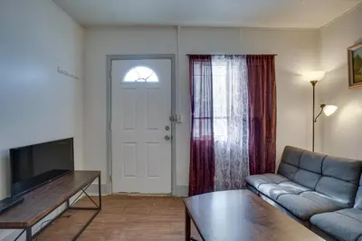 a living room with a couch and a table at Pet-Friendly Vacation Rental Near Boyd Lake! in Loveland